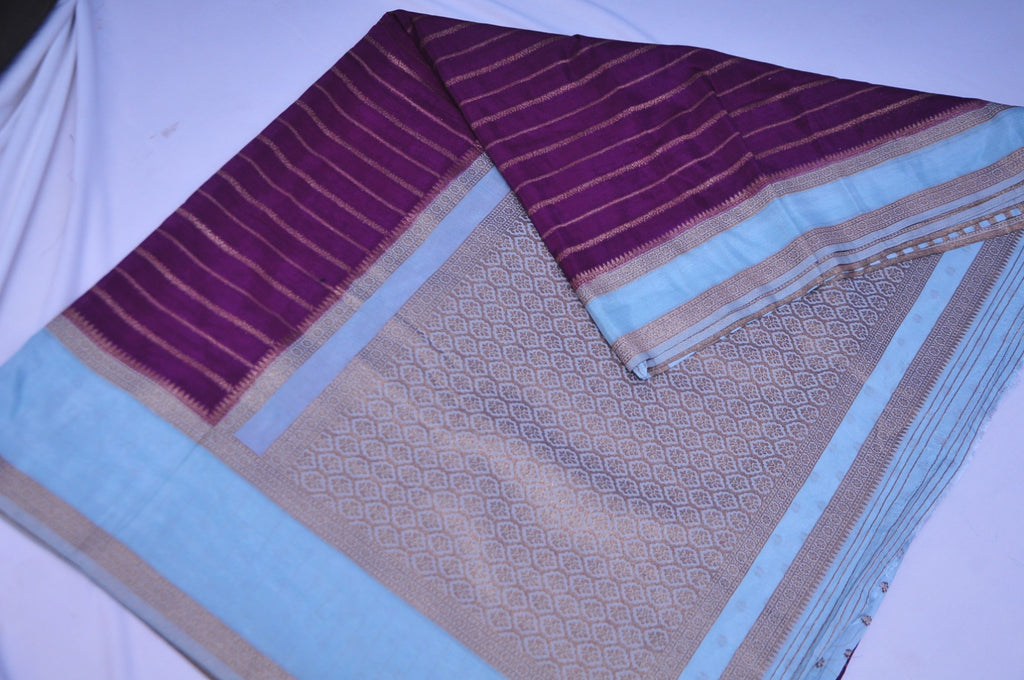 Premium Georgete Saree in Purple with Aqua Blue Border and Golden Zari Stripes